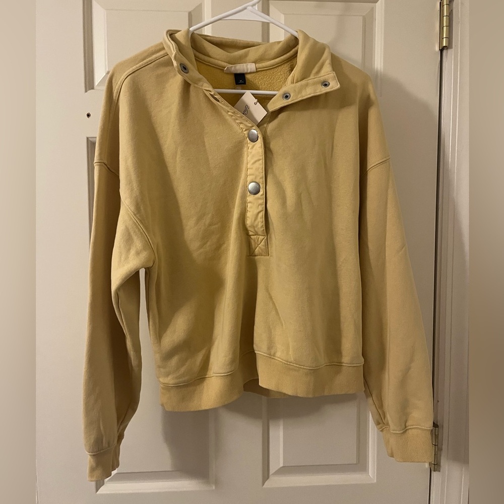 Yellow cropped quarter button up sweatshirts